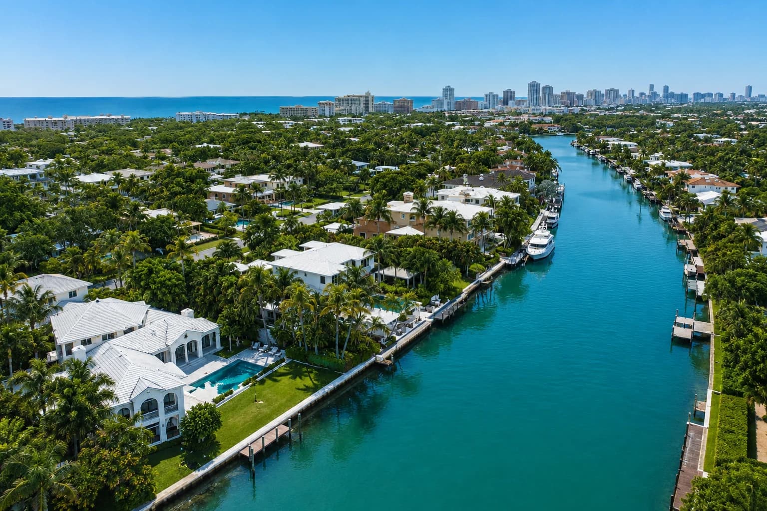 Aerial view of a waterfront neighborhood at golden hour