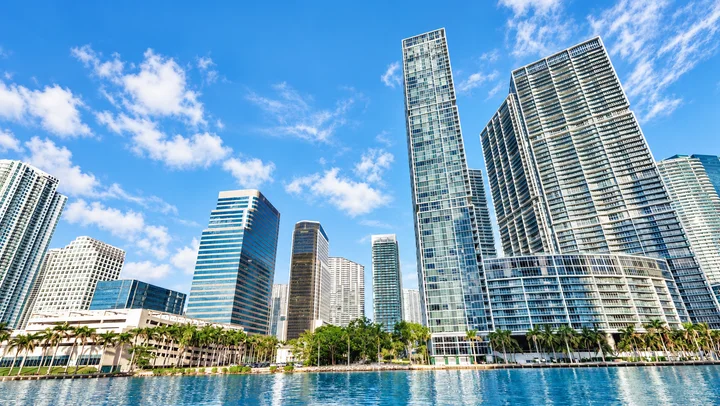 Brickell skyline seen across blue Biscayne Bay water in daylight