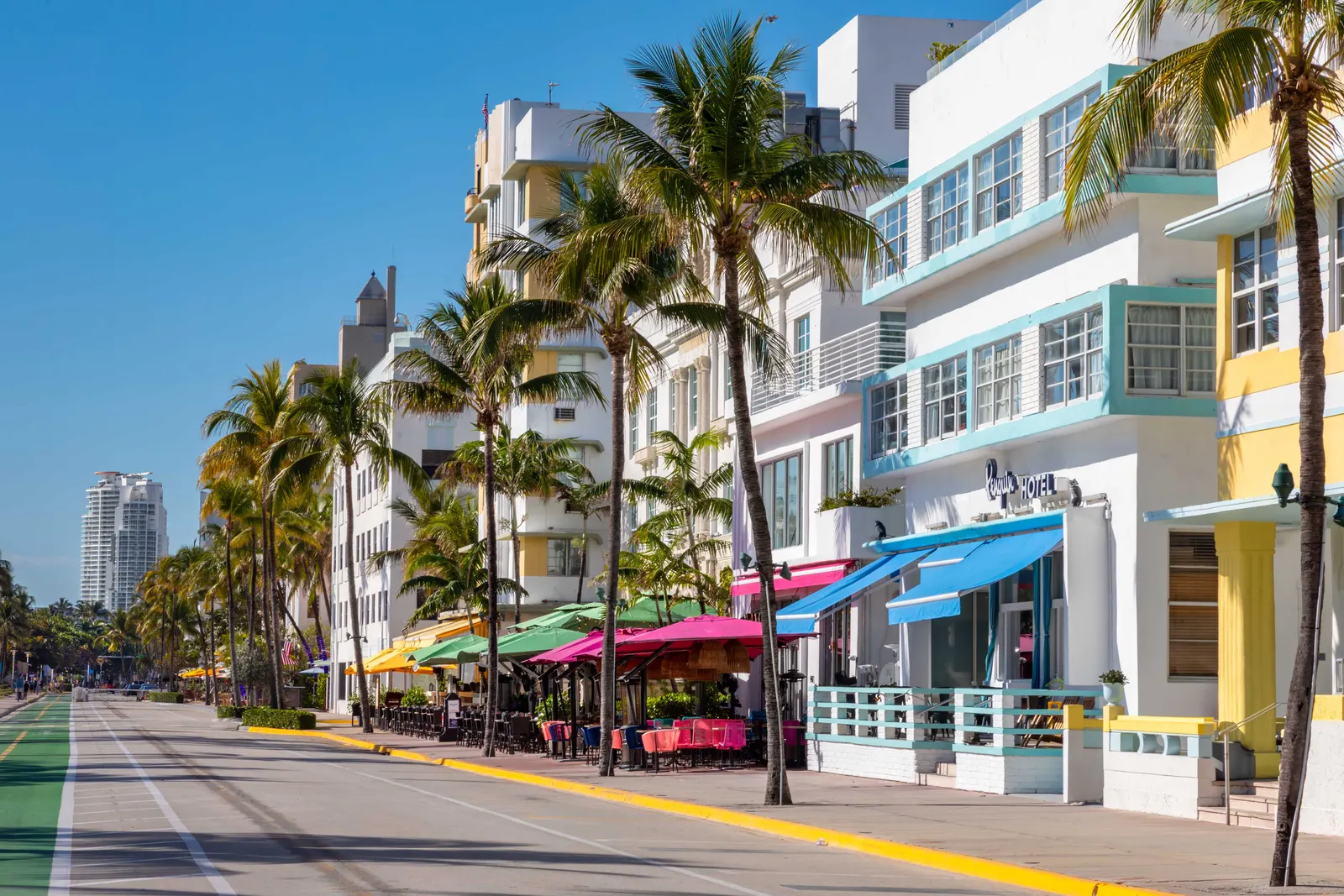 Pastel Art Deco hotels and palm trees along Ocean Drive in Miami Beach
